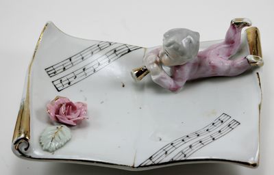 Child Playing Music Figurine