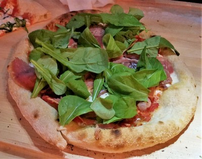 Neapolitan style pizza on the grill, Prosciutto pizza with baby spinach