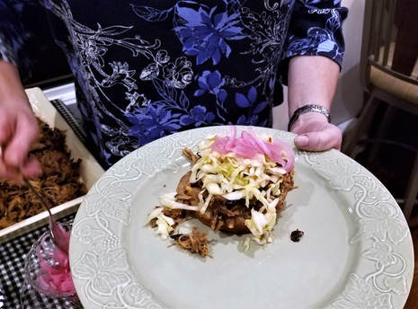 North Carolina Style Pulled Pork Sandwiches with Coleslaw and Pickled Onions