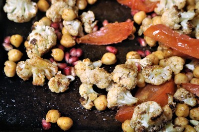 Warm Spiced Cauliflower with Chickpeas and Pomegranate Seeds - add pomegranate seeds after roasting